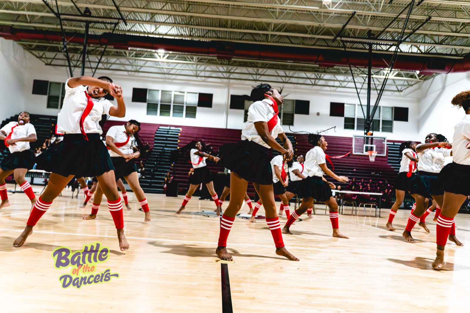 A crew performing full out